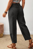 Back view of carbon grey barrel leg jeans with elastic back waistband and seam detail