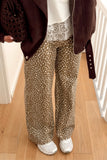 Brown cheetah print wide leg jeans with lace cami and leather jacket