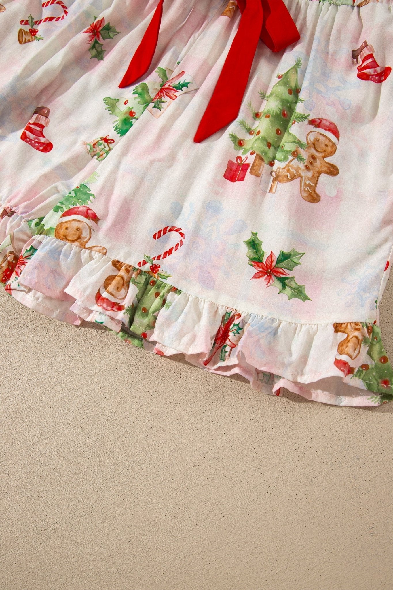 White Christmas ruffled skirt with gingerbread and candy cane print.