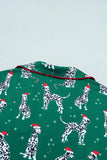 Green Dalmatian pajama fabric with Santa hats and red piping.