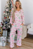 Woman in pink long-sleeve pajamas with Christmas tree and snowman print.