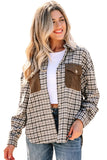 Woman wearing a plaid shirt with brown pocket flaps on a white background