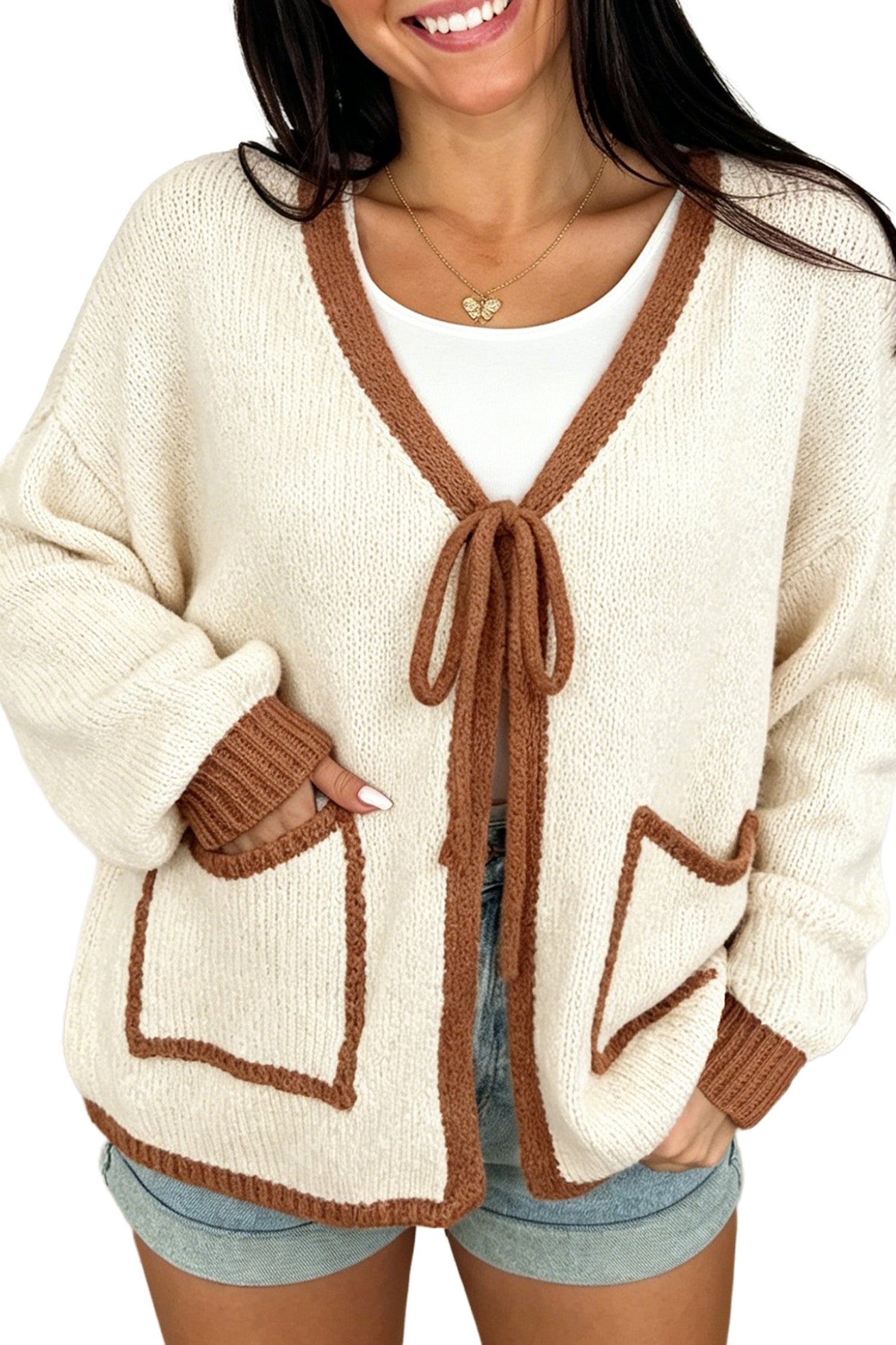 Side view of apricot tie front cardigan with chestnut trimmed patch pocket
