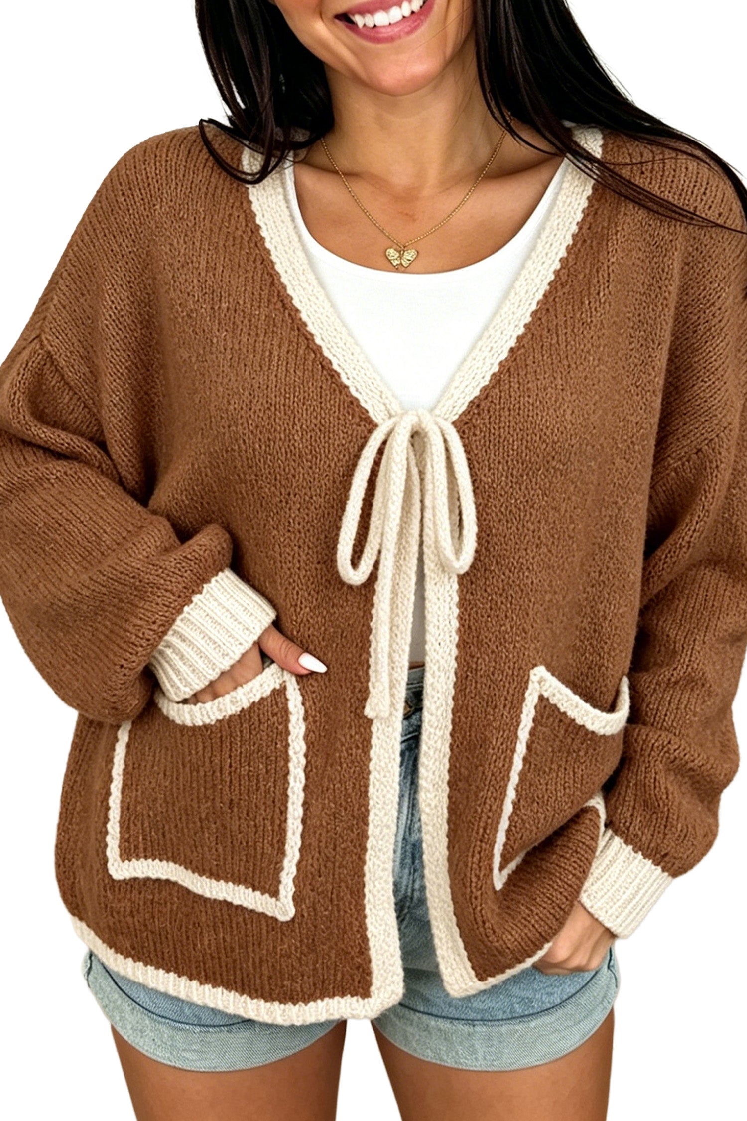 Side view of chestnut tie front cardigan with cream trimmed patch pocket