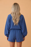 Dark blue half button puff sleeve pullover and shorts 2-piece set, back view
