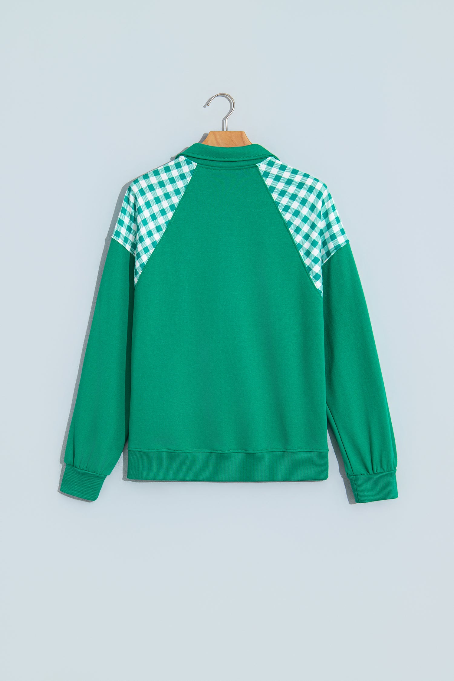 Dark green plaid quarter zip sweatshirt, back view with gingham raglan shoulders