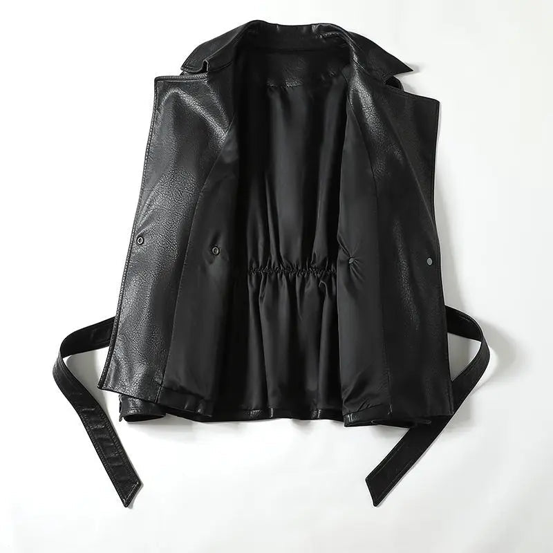 Black leather vest with straps on a white background
