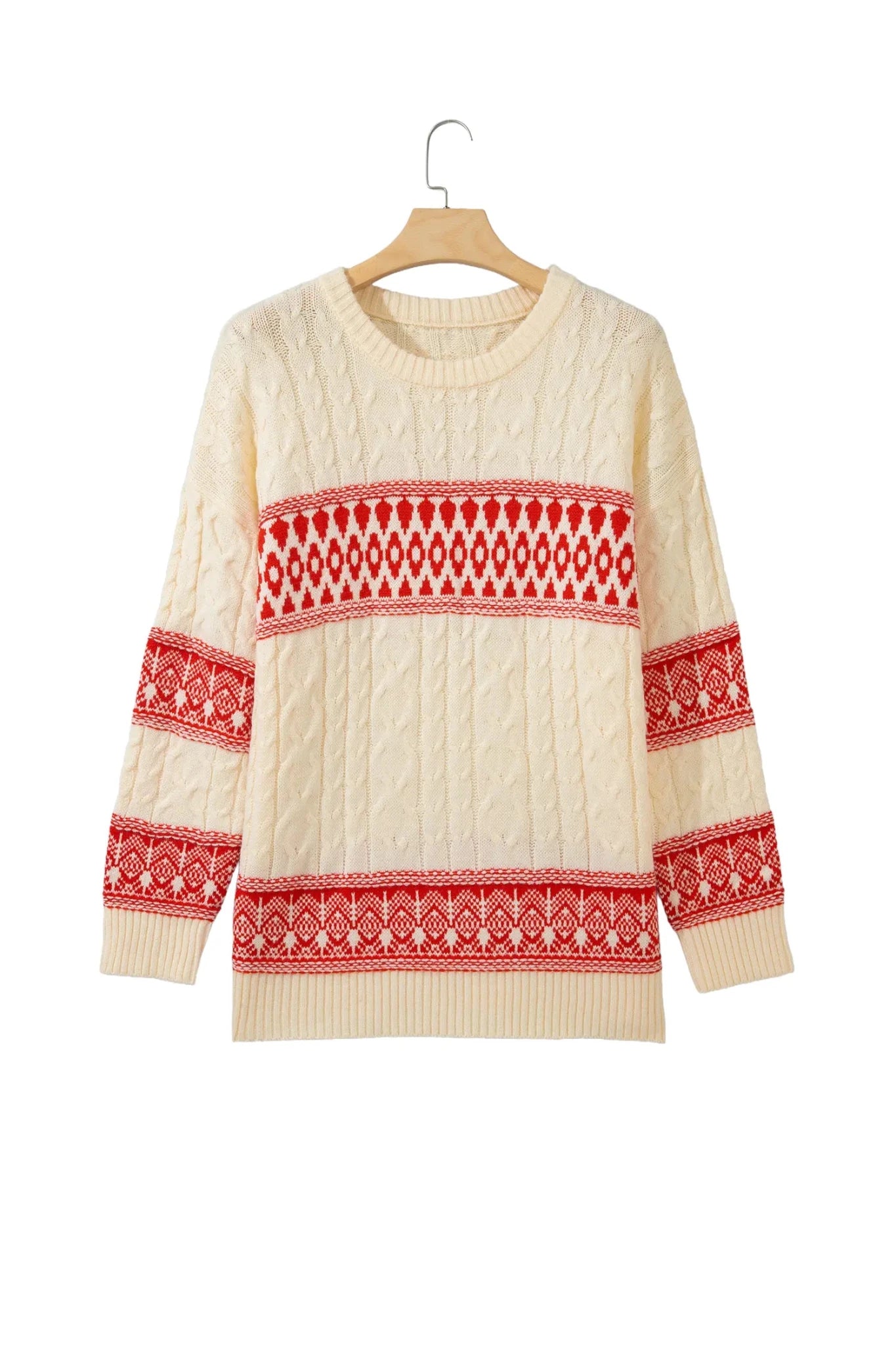 Cream cable-knit sweater with red-white Fair Isle patterns on hanger.
