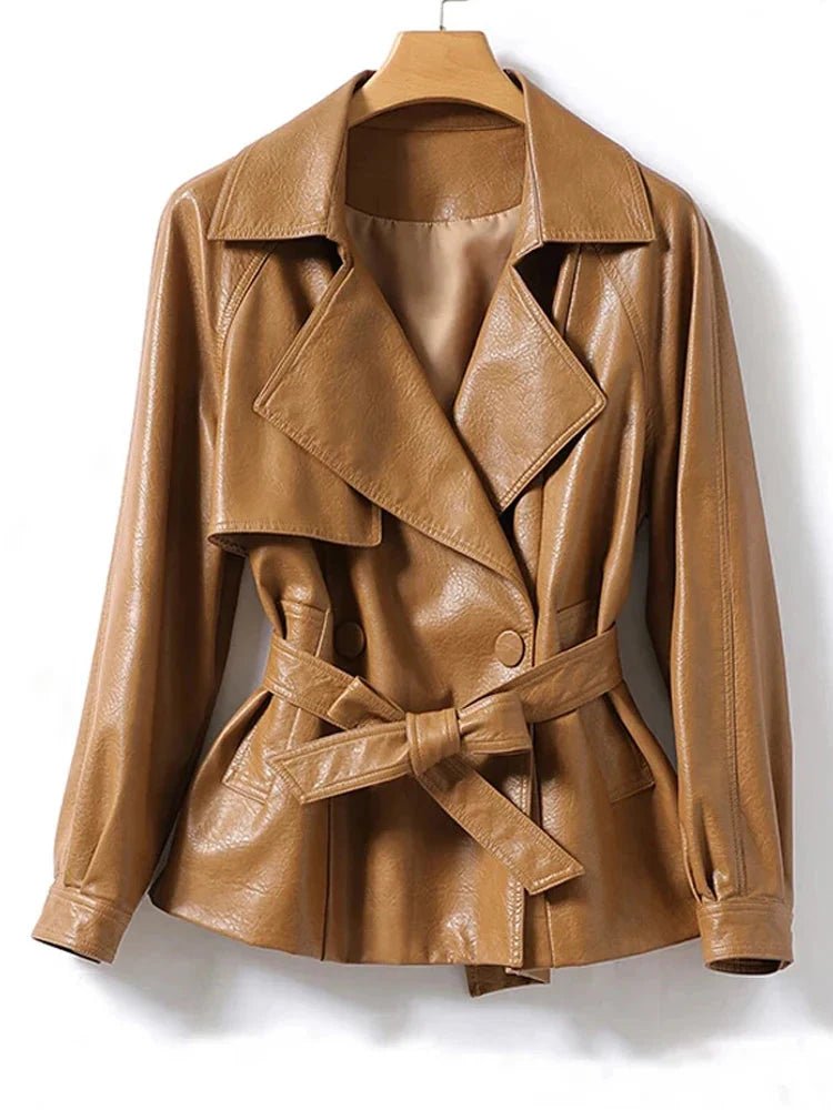Brown leather jacket on a hanger against a white background