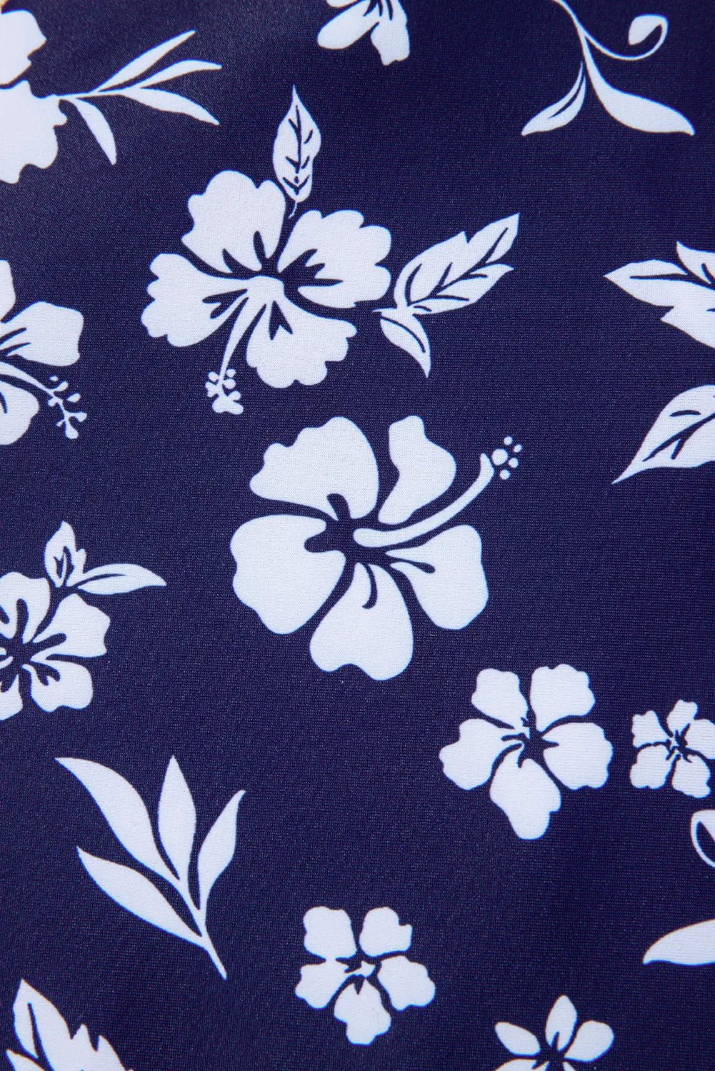 White floral pattern on a navy blue background