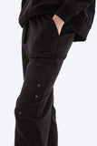 Black pants with star patterns on a white background