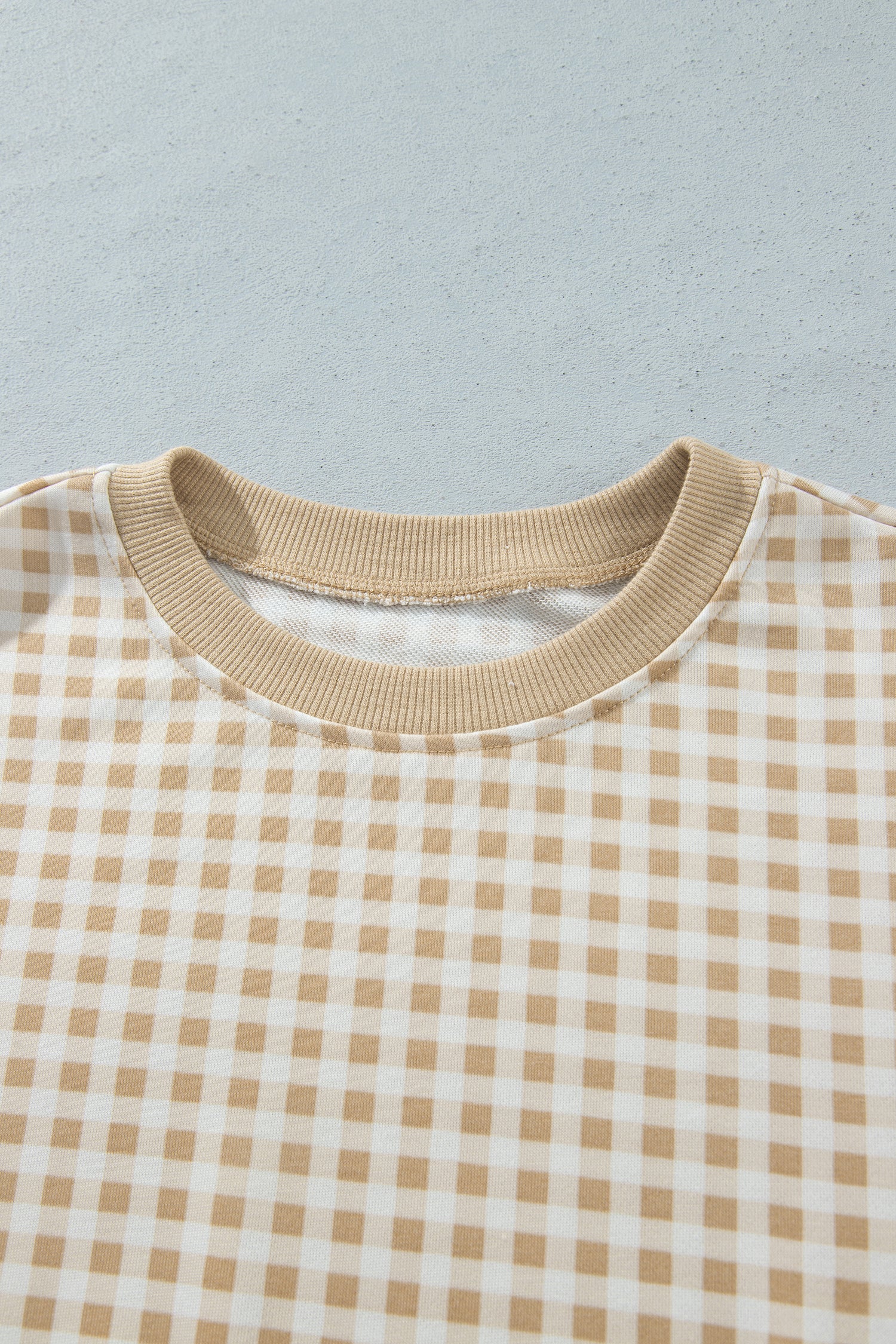 Khaki gingham pullover ribbed round neckline detail