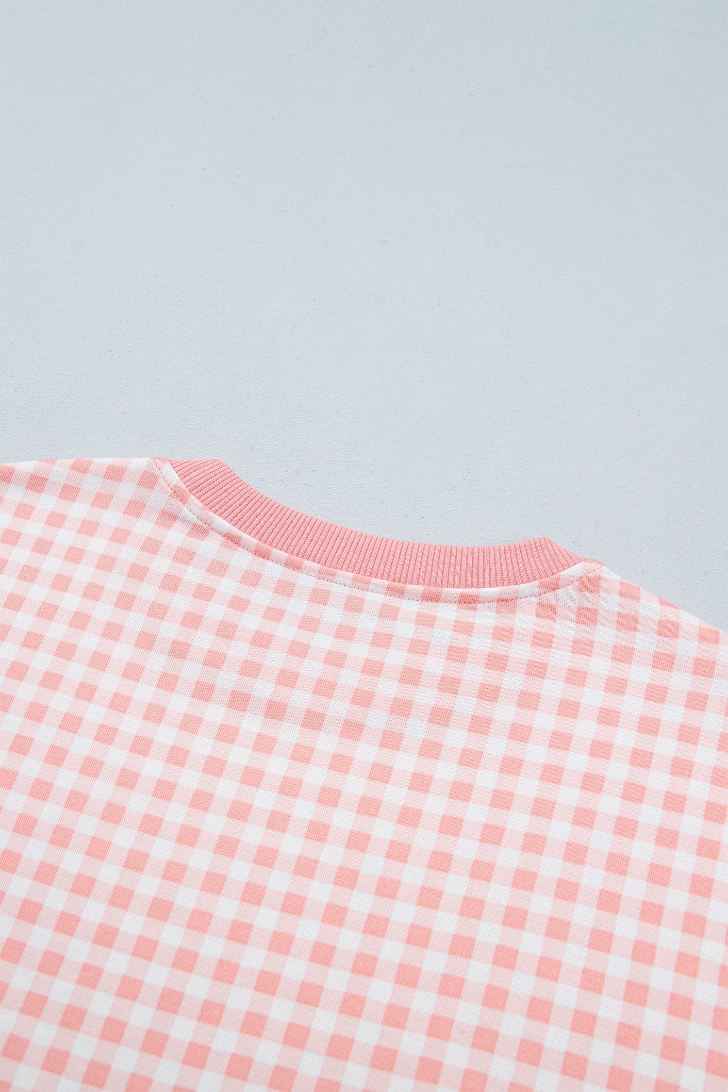 Pink gingham pullover back neckline detail