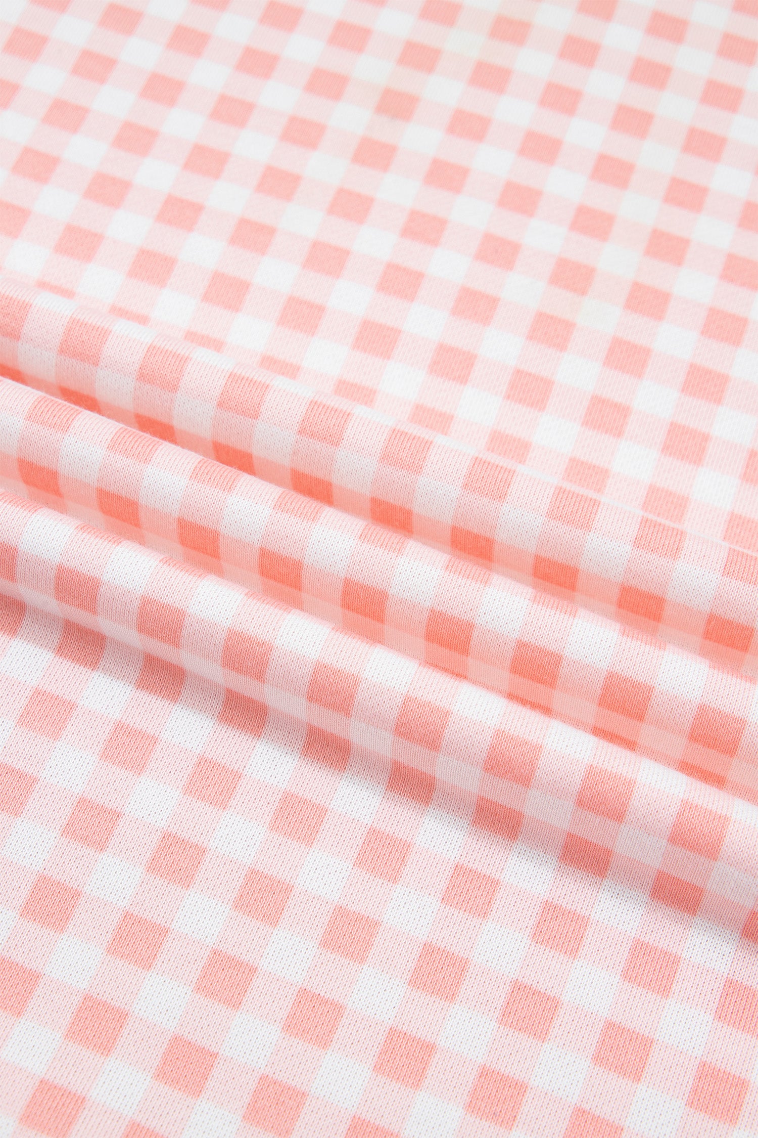 Close-up of pink and white gingham fabric