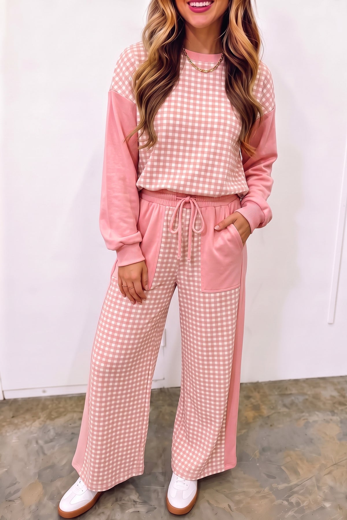 Women's pink gingham color block pullover and wide leg pants set, front view
