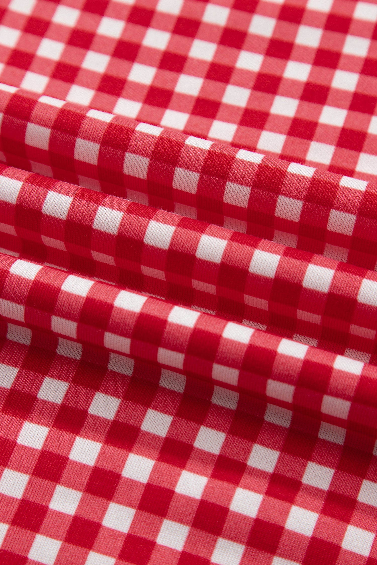 Close-up of red and white gingham fabric