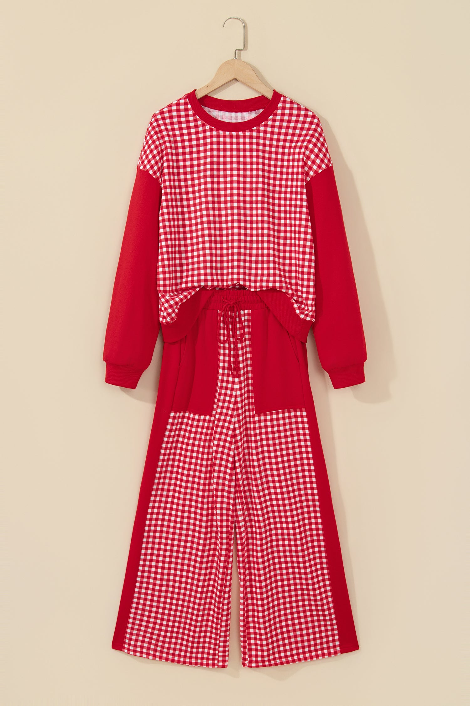 Red gingham color block set on a hanger, front view