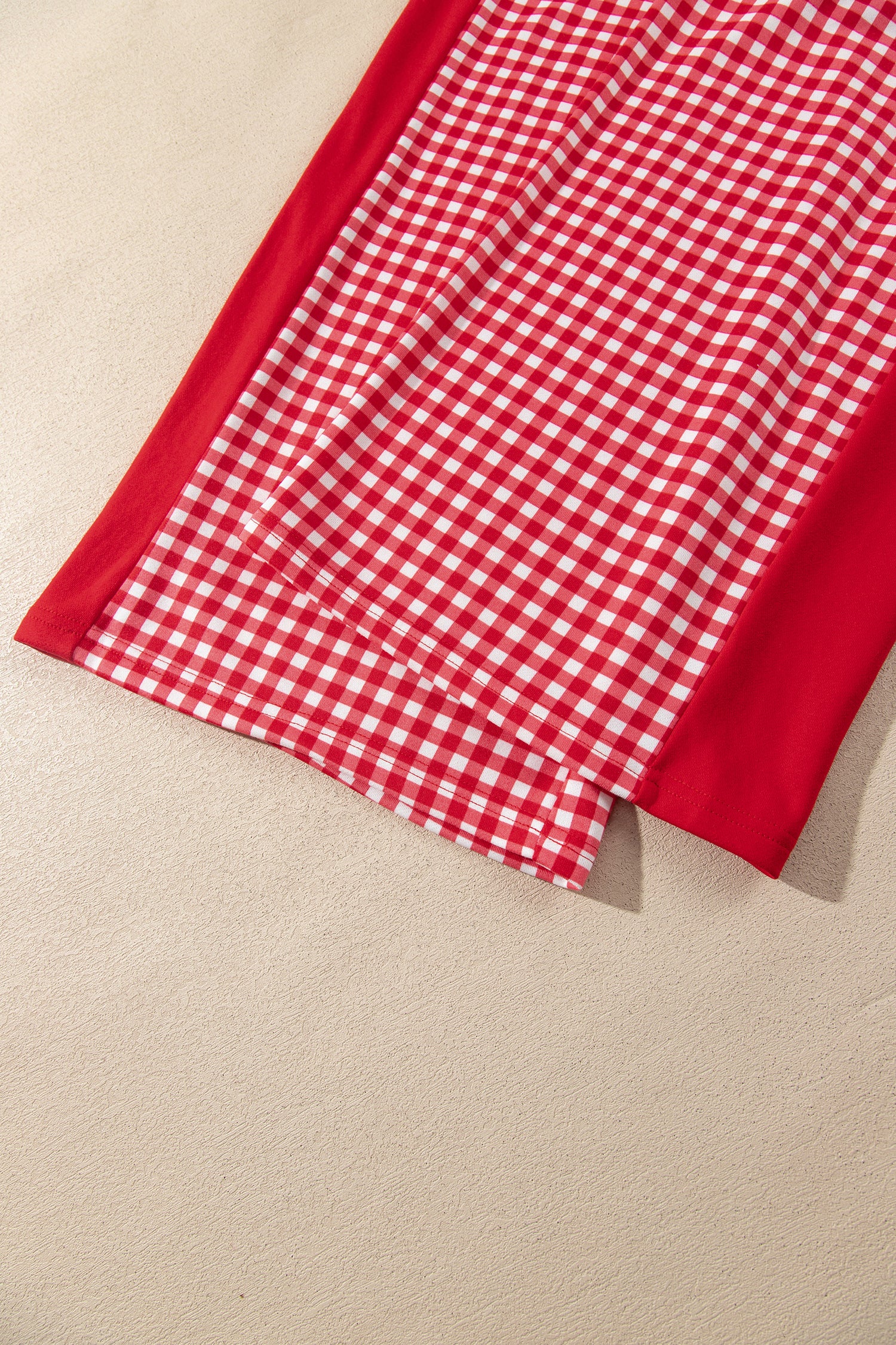 Red gingham wide leg pants hem and side panel detail