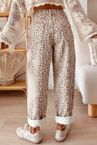 Gray leopard print relaxed jeans, back view with cuffed hems and sneakers