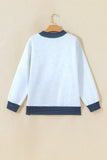 Gray sweatshirt with navy polka dot trim on hanger, back view