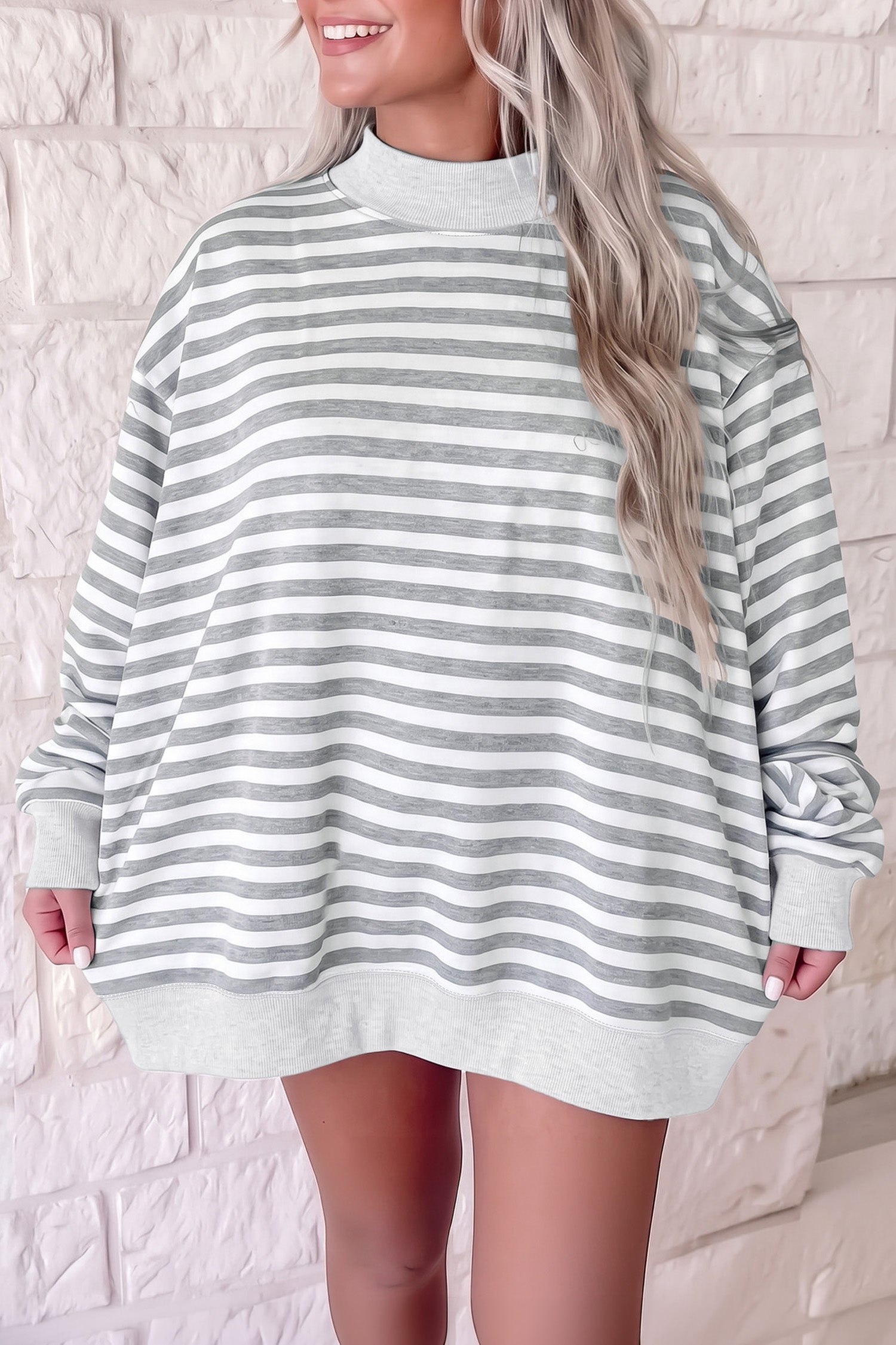 Gray and white striped mock neck oversized tunic sweatshirt, front view