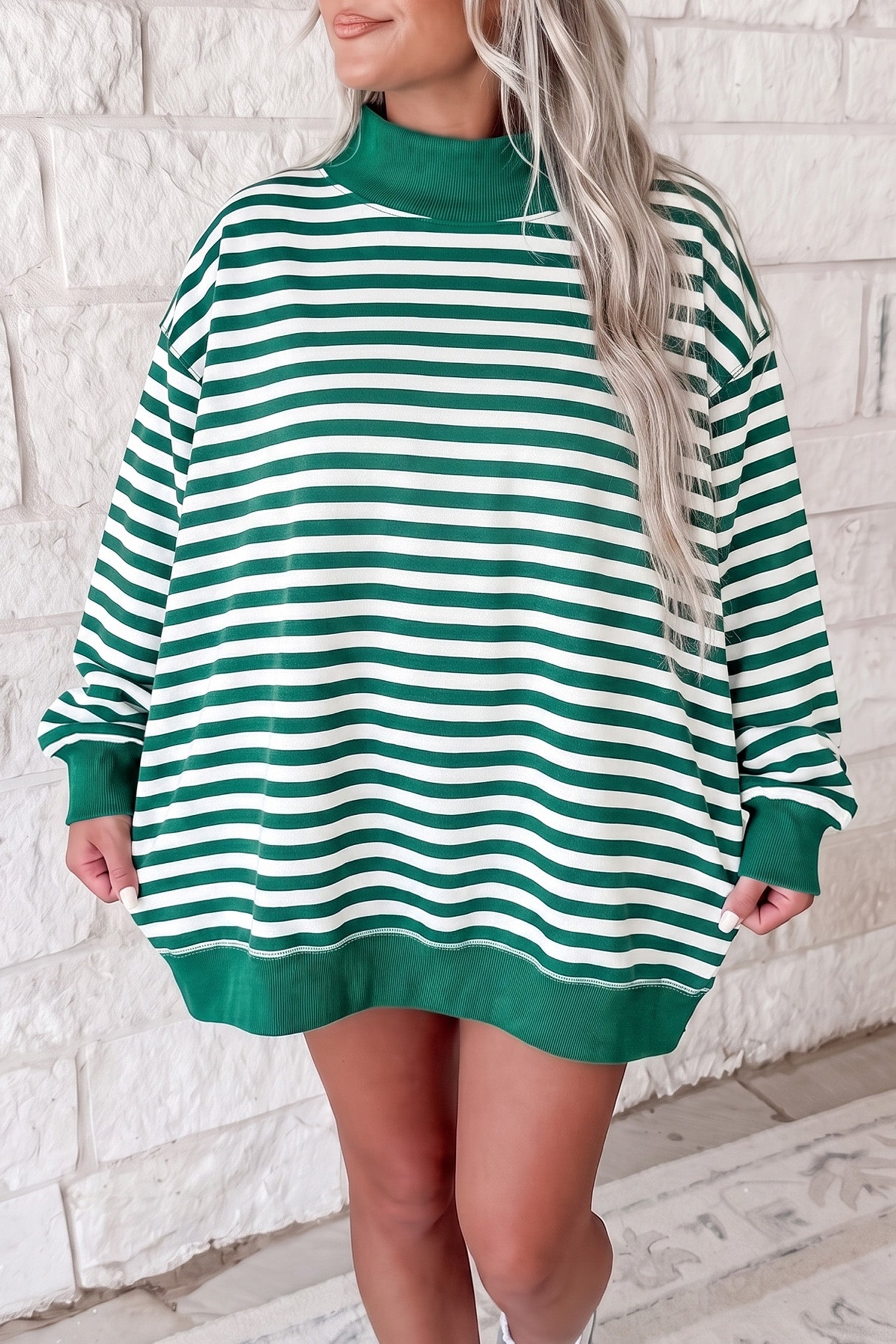 Green and white striped mock neck oversized tunic sweatshirt, front view
