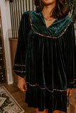 Green velvet shift dress with leopard trimmed yoke and sleeves, close view