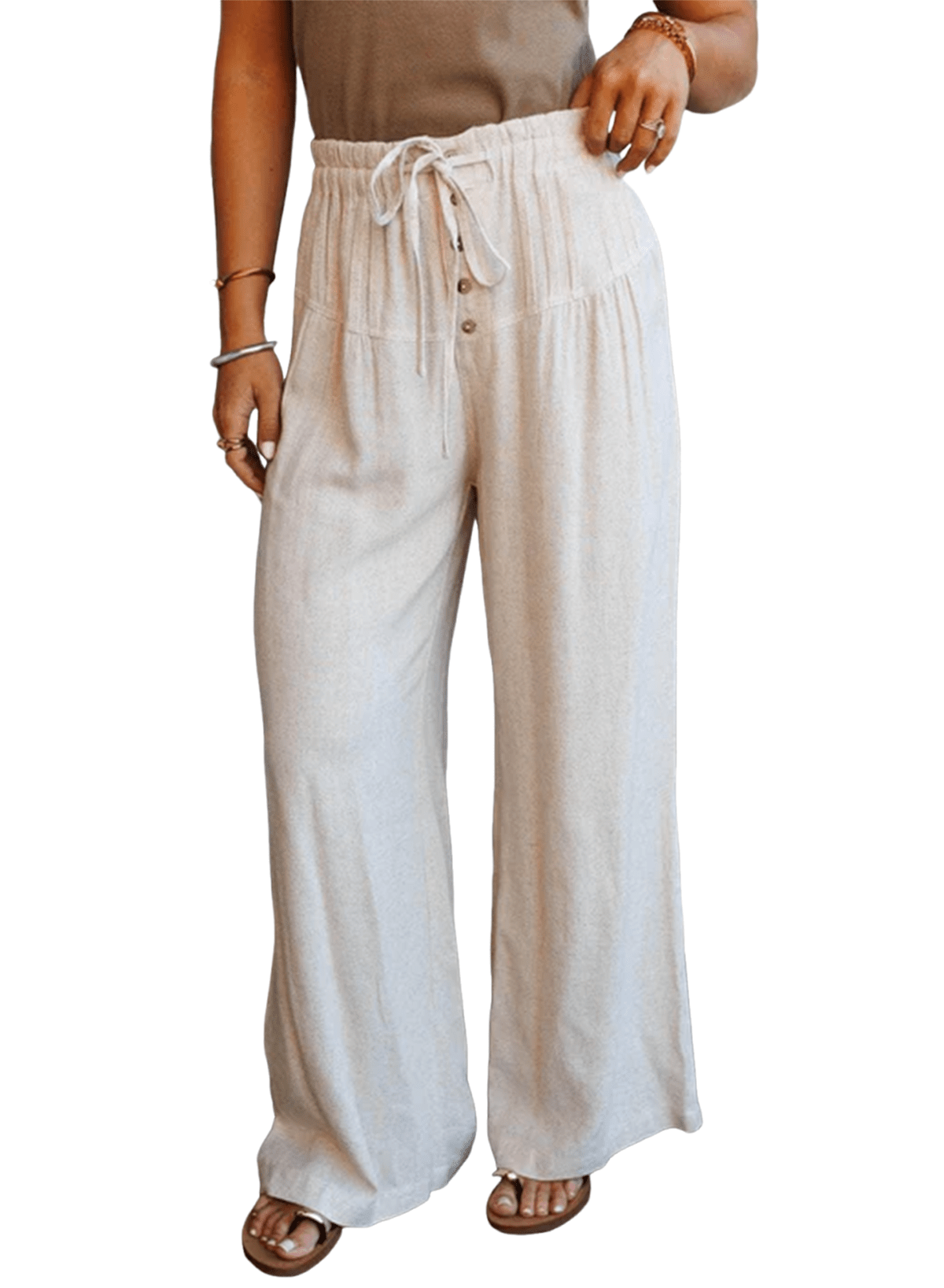 Beige wide-leg pants worn by a person on a white background