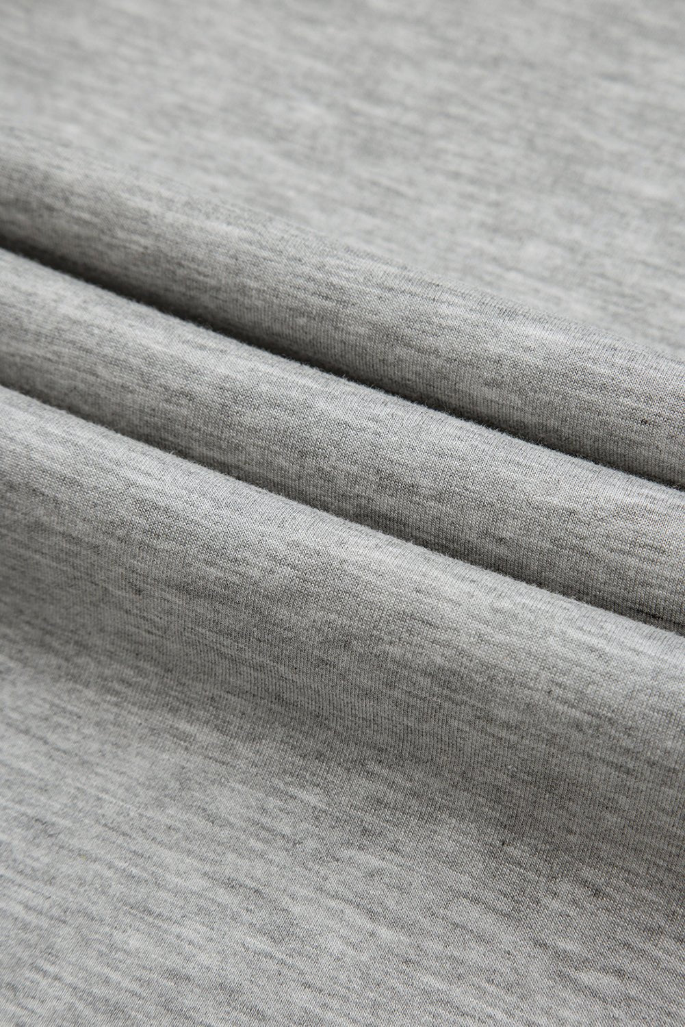 Close-up of gray fabric with a textured pattern