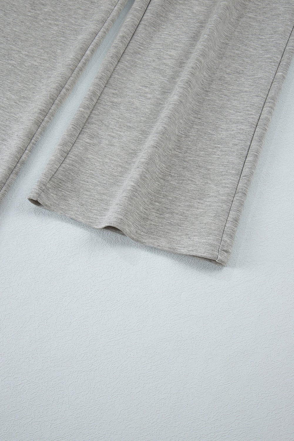 Close-up of gray fabric on a light gray background