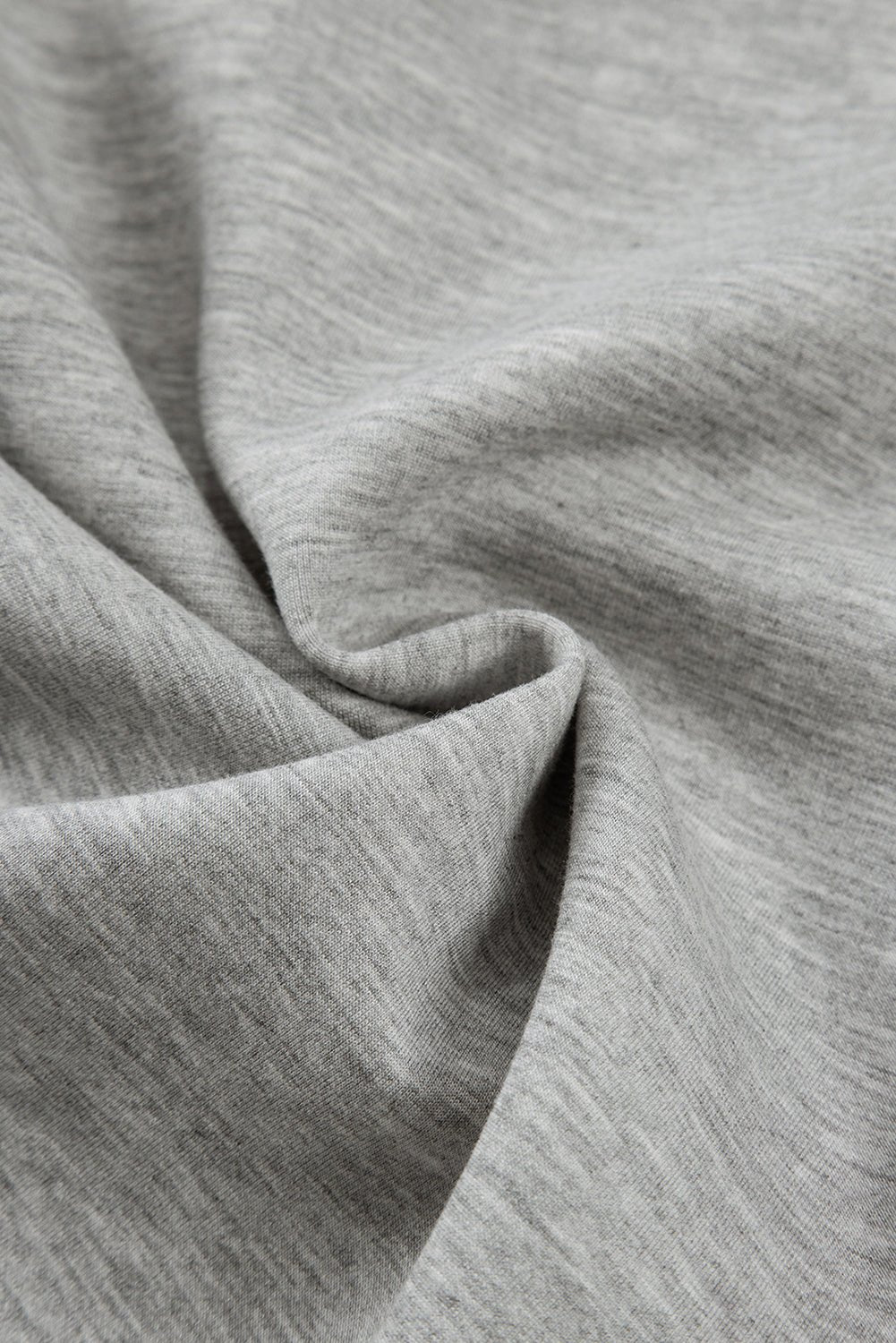 Close-up of gray fabric with folds