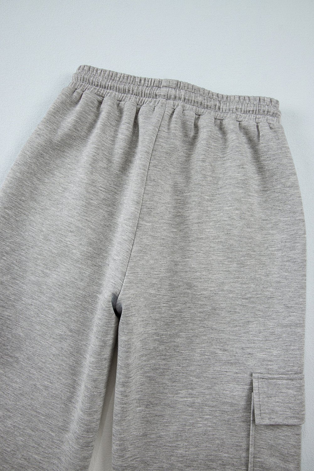 Gray sweatpants on a light gray background
