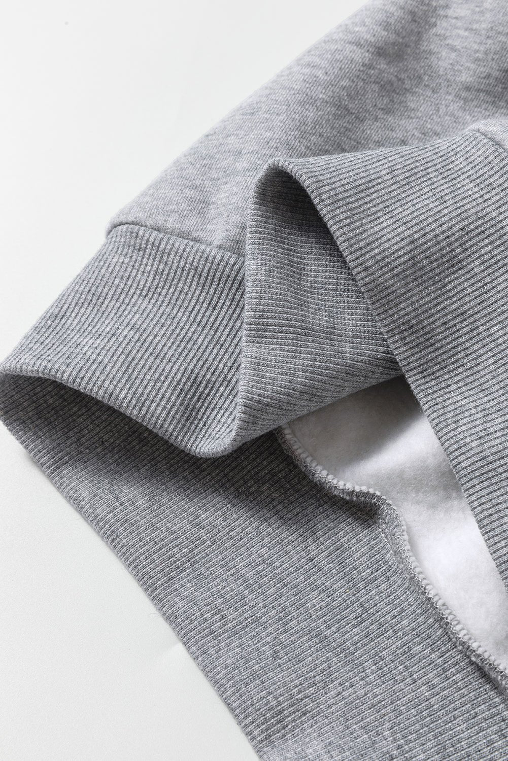 Close-up of gray fabric with a white background
