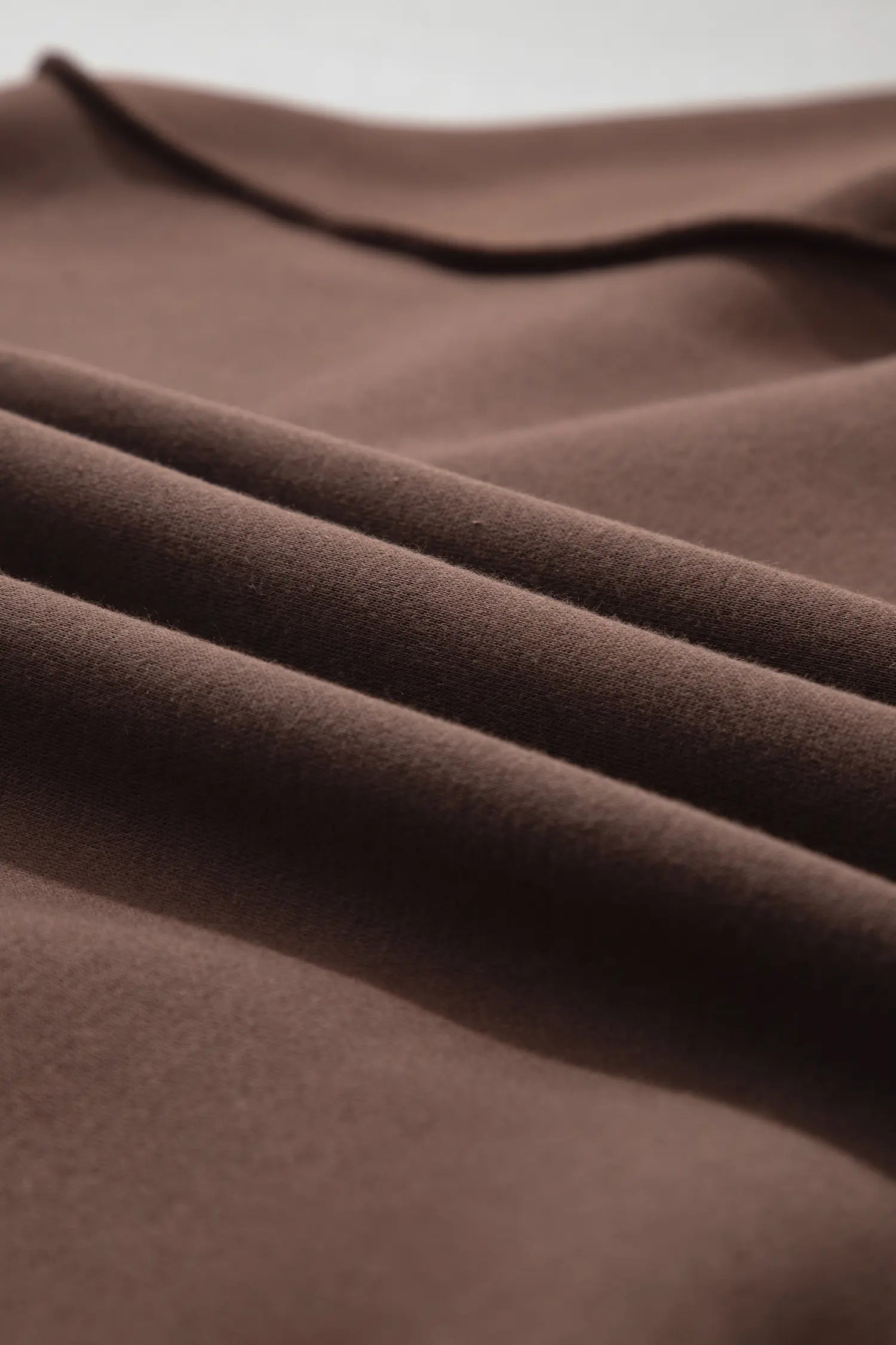 Close-up of soft coffee brown fleece fabric