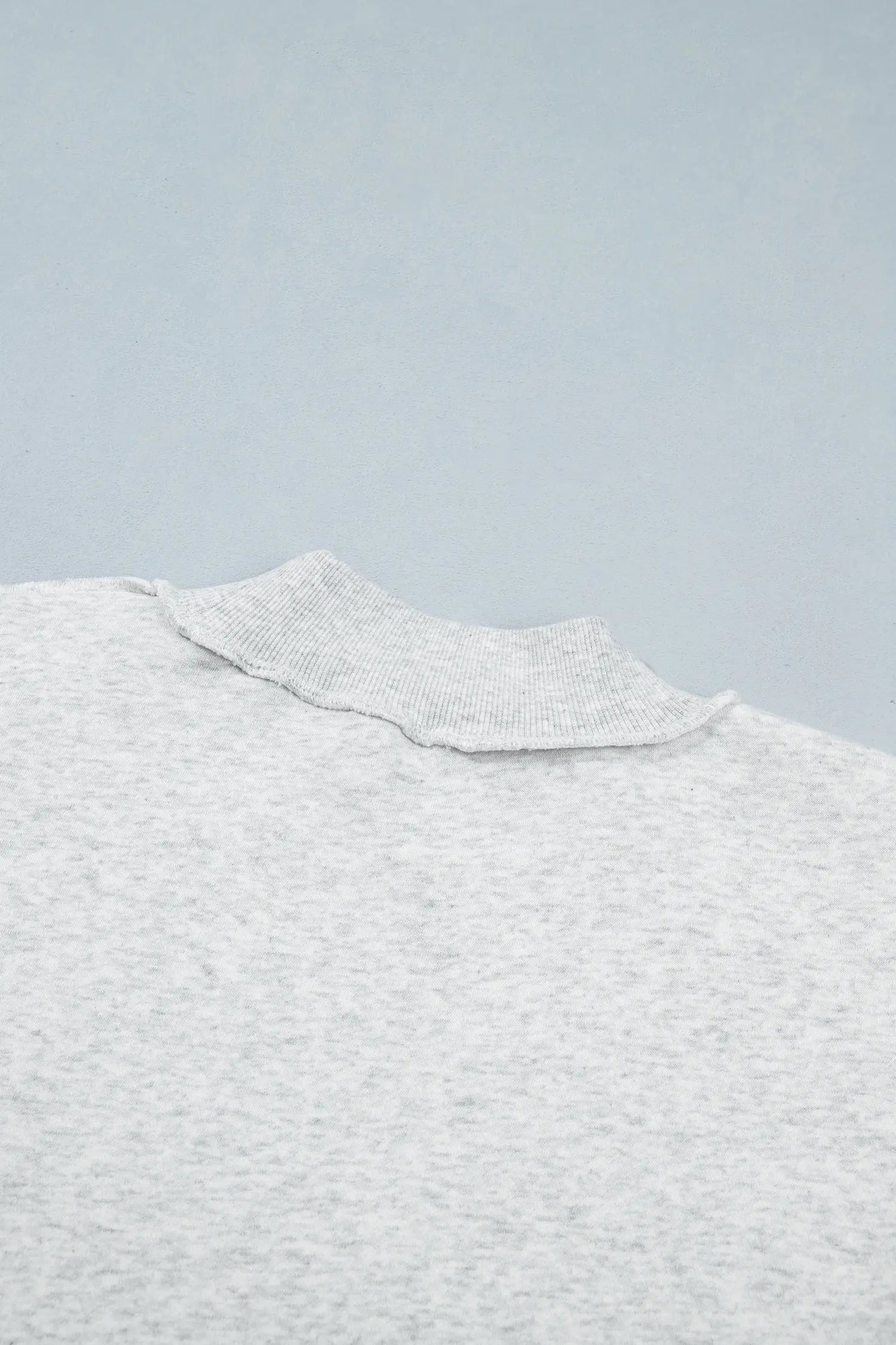 Back mock neck detail on gray heather sweatshirt