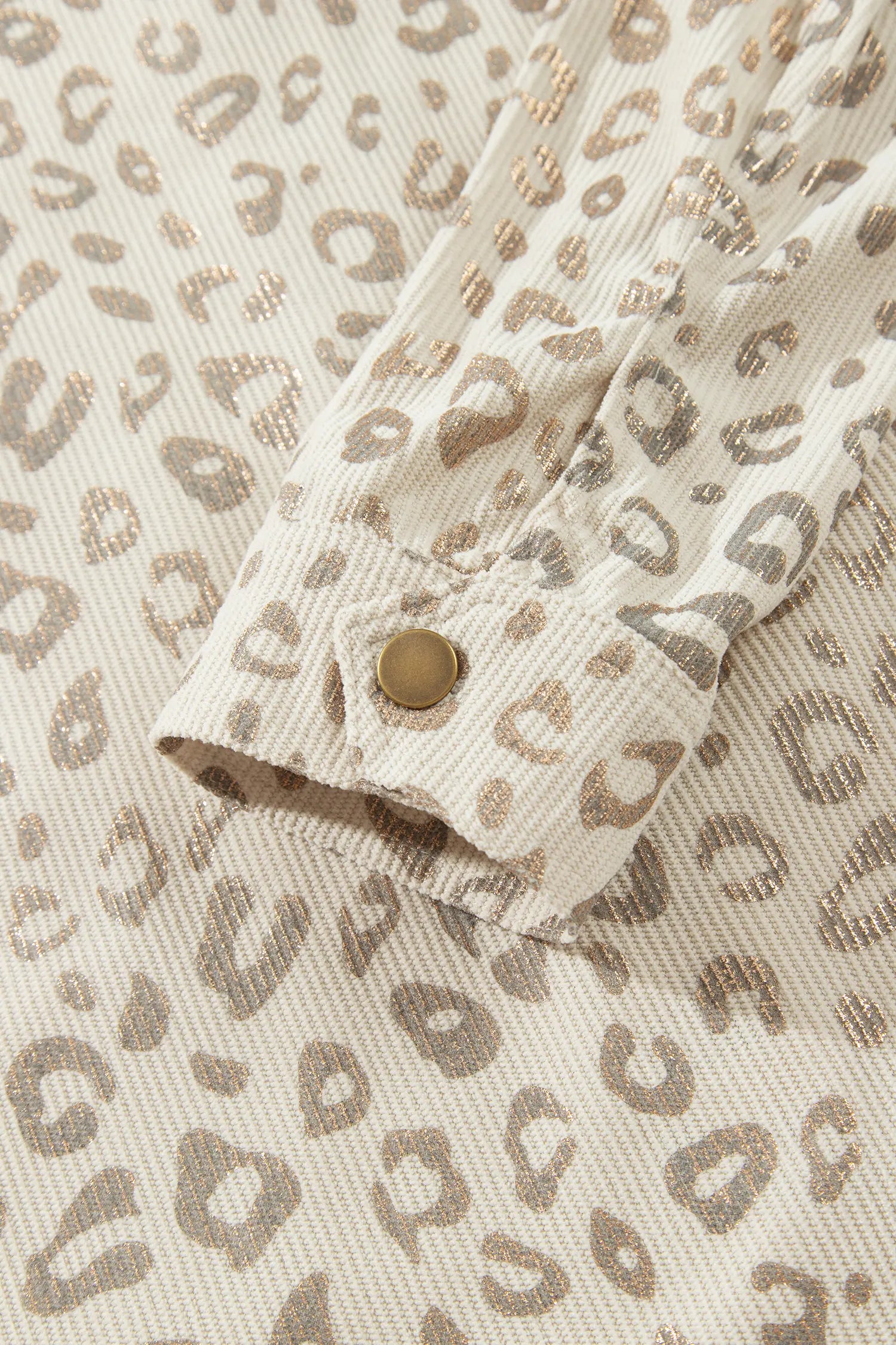 Snap cuff on khaki leopard corduroy shirt jacket sleeve