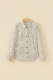 Khaki leopard corduroy shirt jacket on a hanger, front view