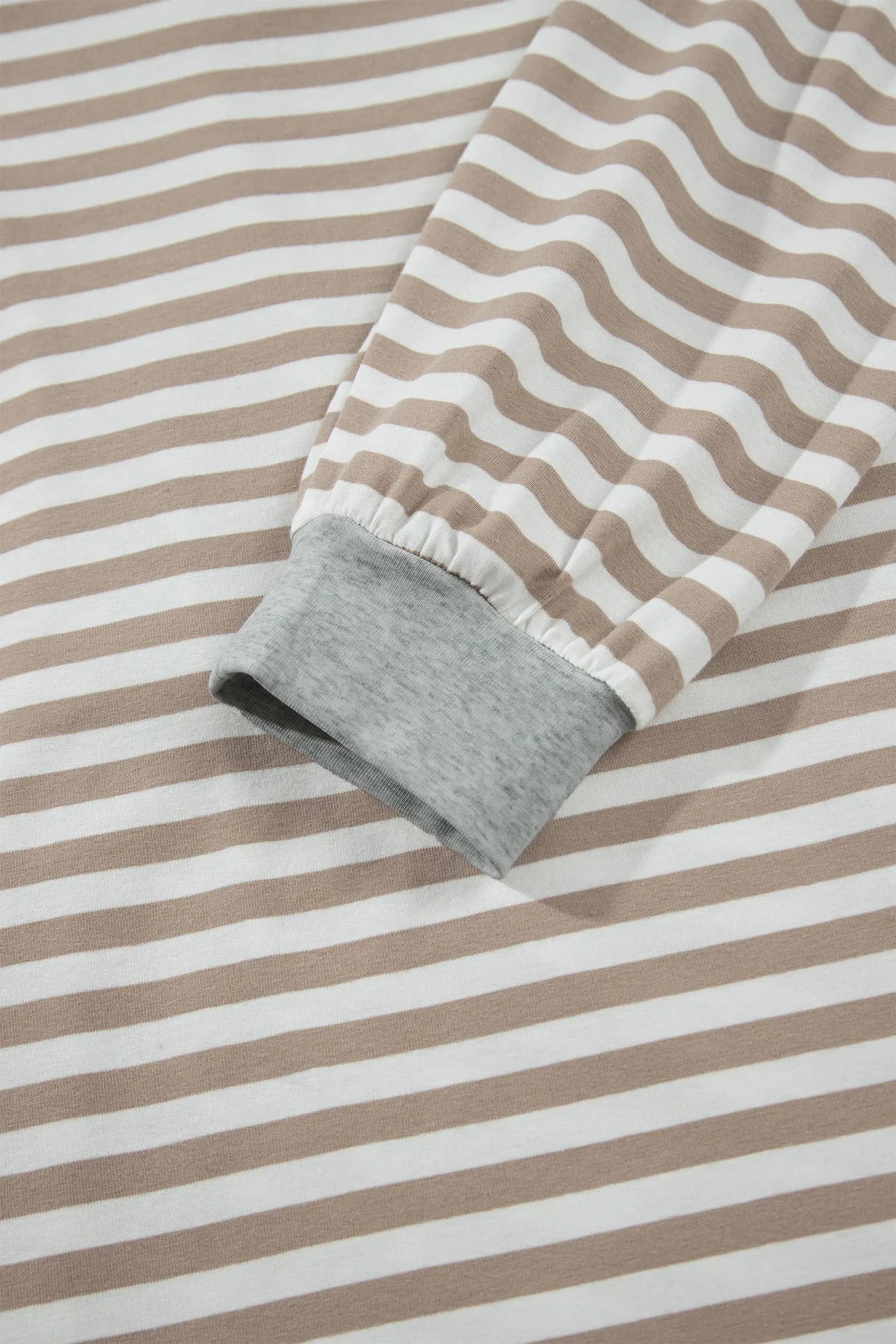 Gray ribbed cuff on khaki stripe long sleeve dress
