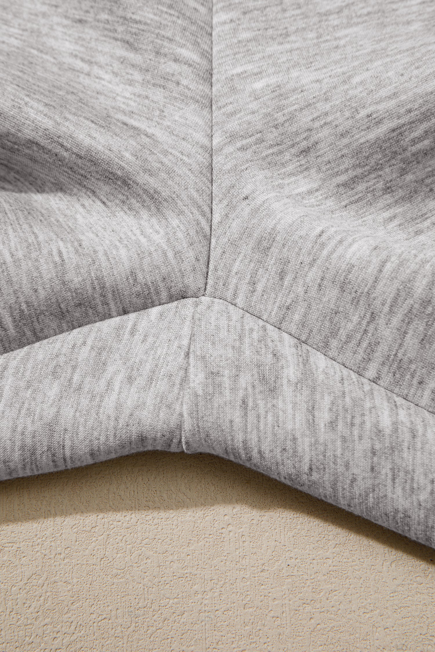 Close-up of soft heather gray knit fabric