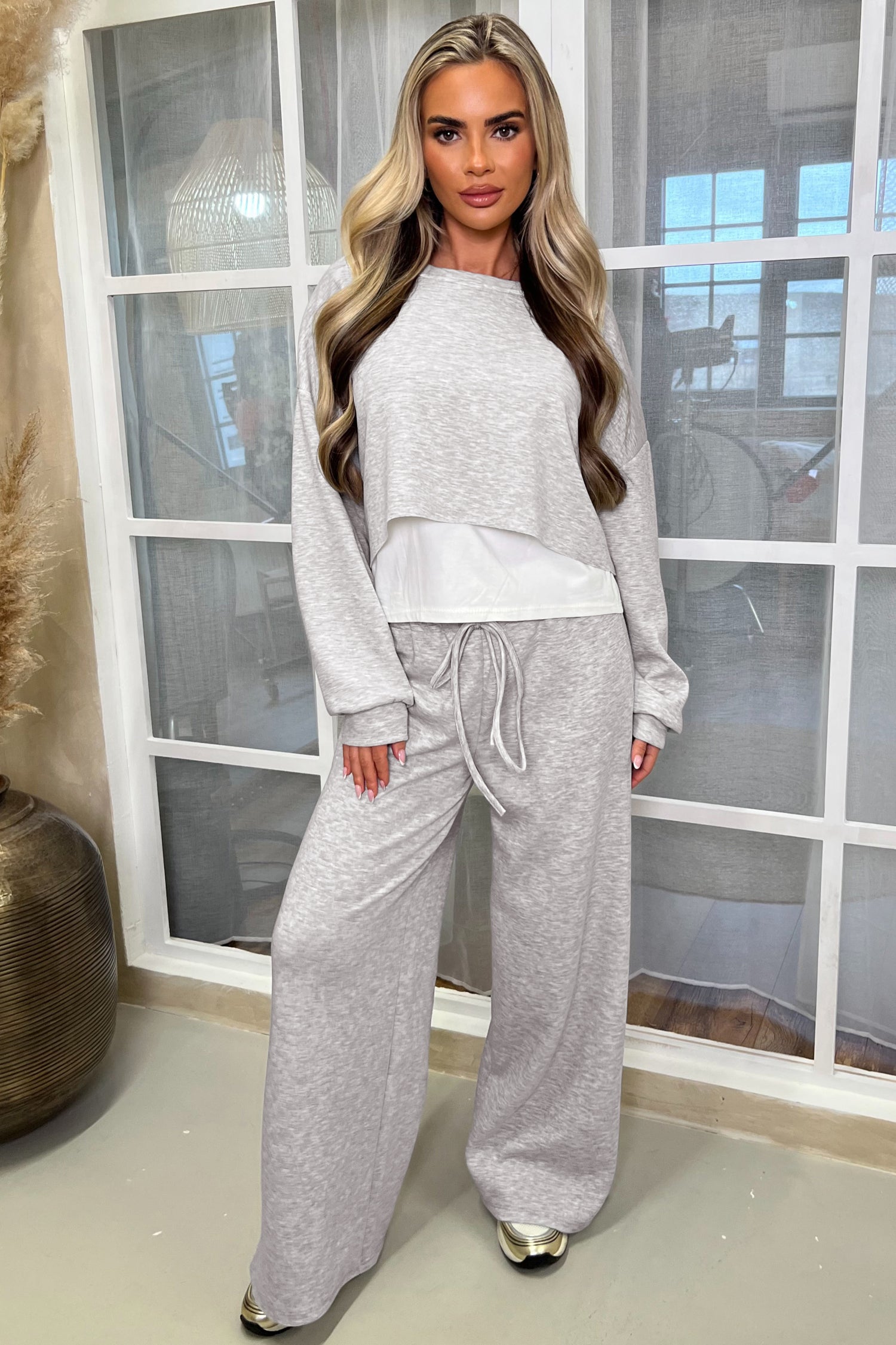 Heather gray crop top with white under-layer and wide leg pants set, full length