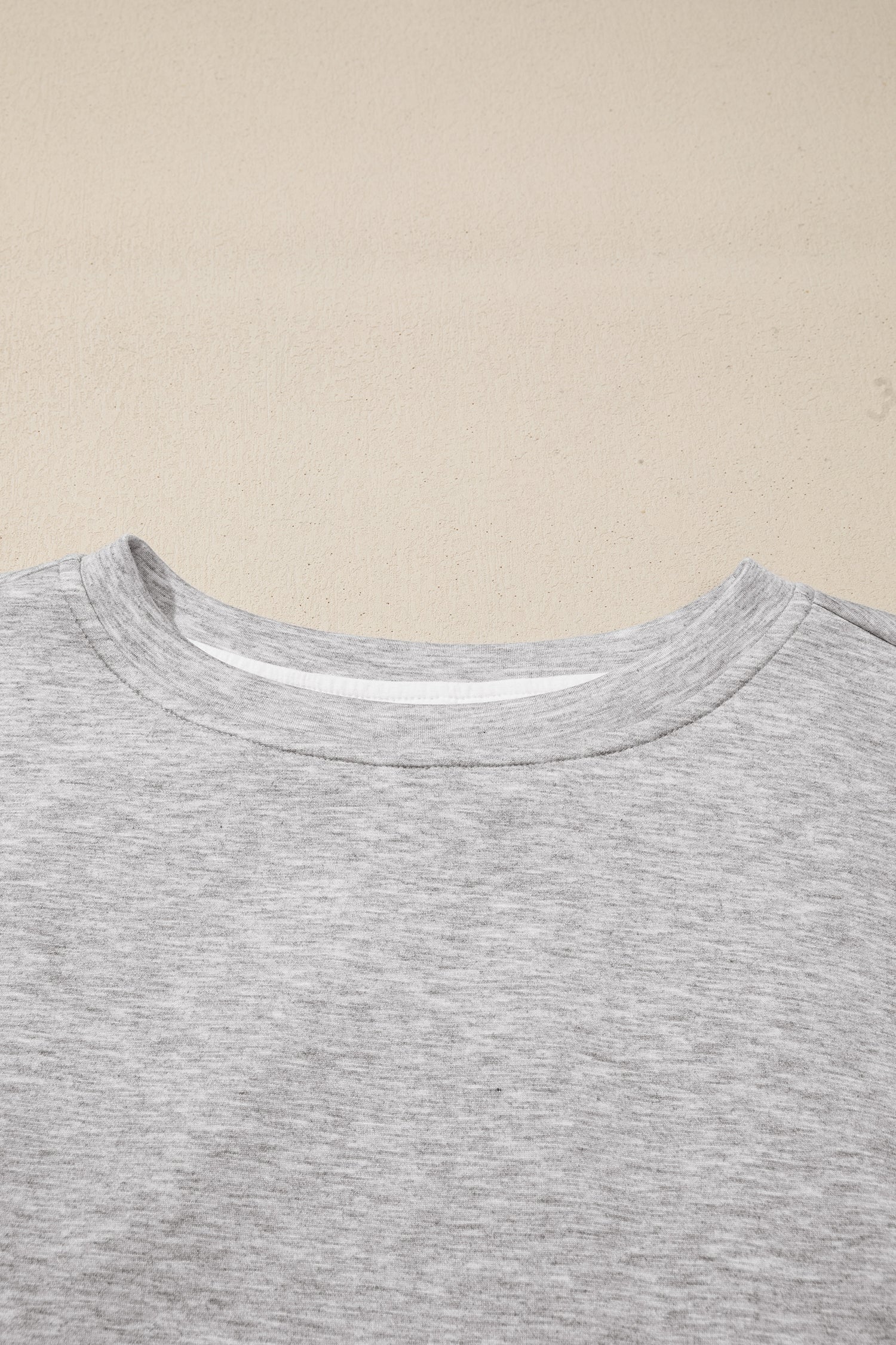 Heather gray crop top round neckline detail