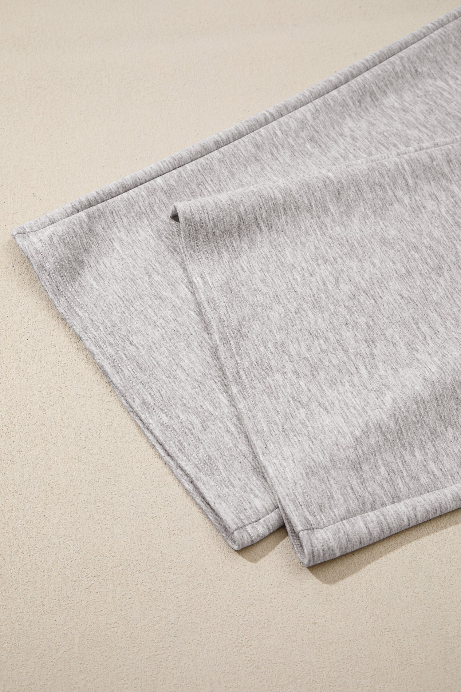 Gray wide leg pants hem detail