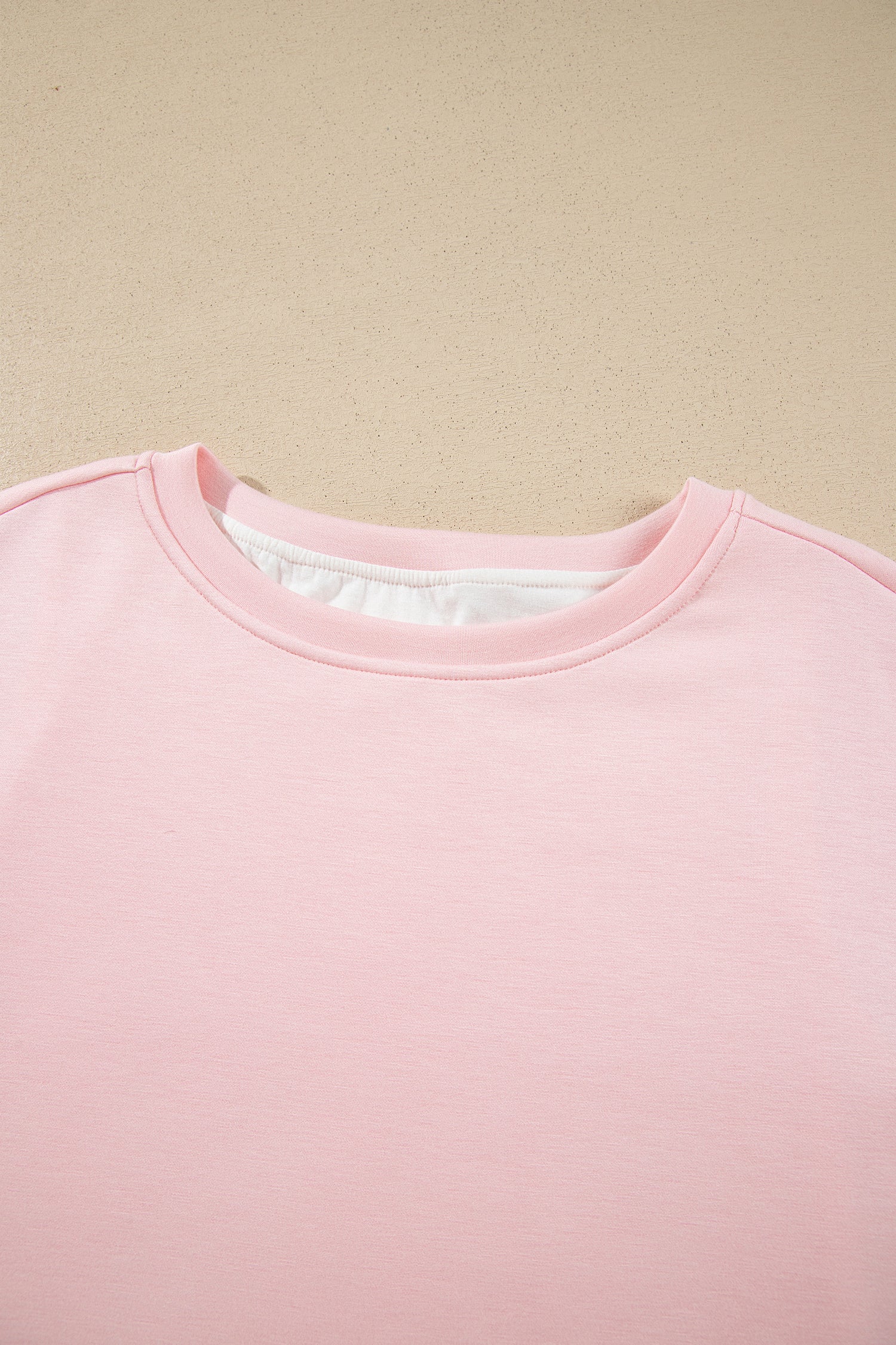 Pink crop top round neckline detail