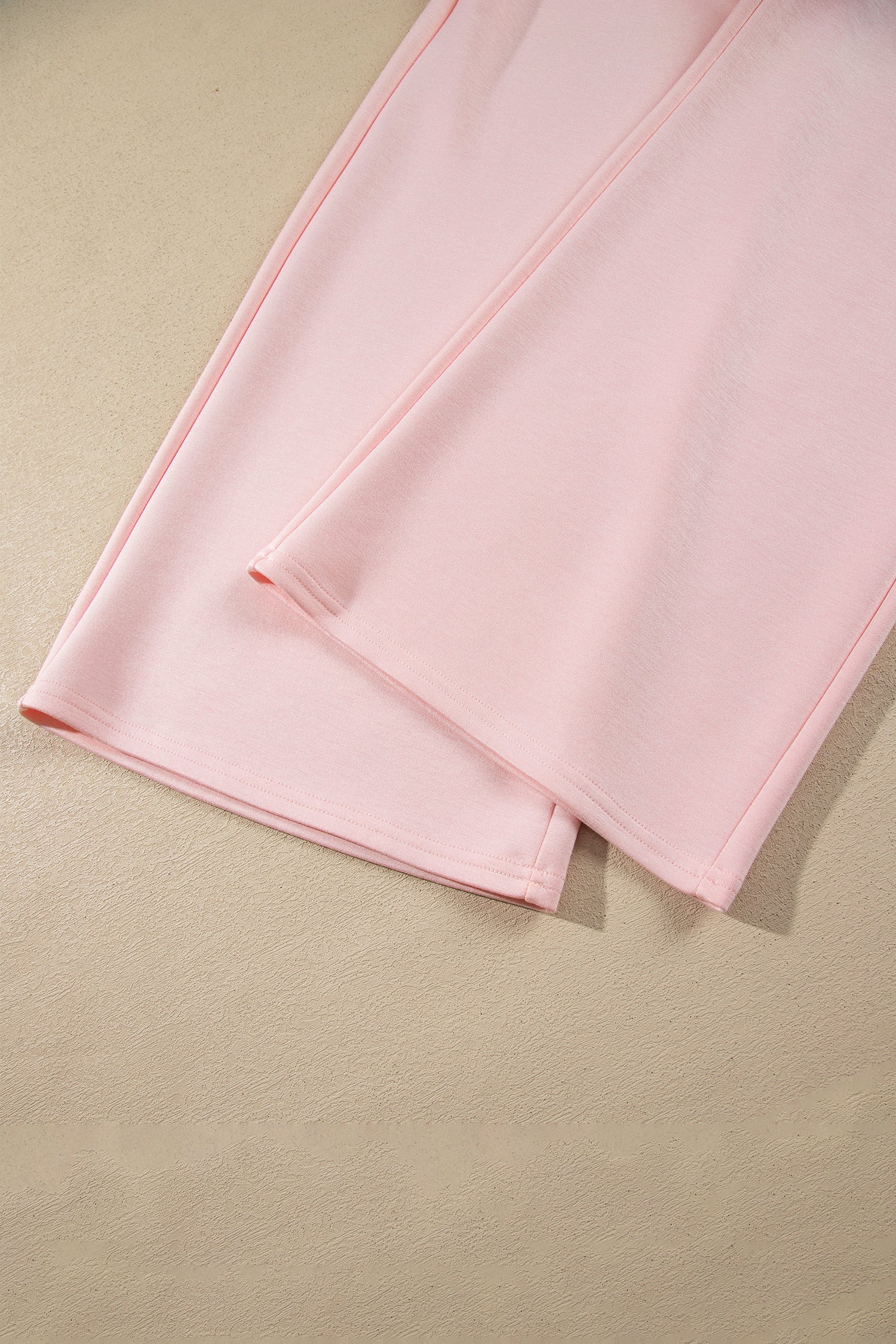 Pink wide leg pants hem detail