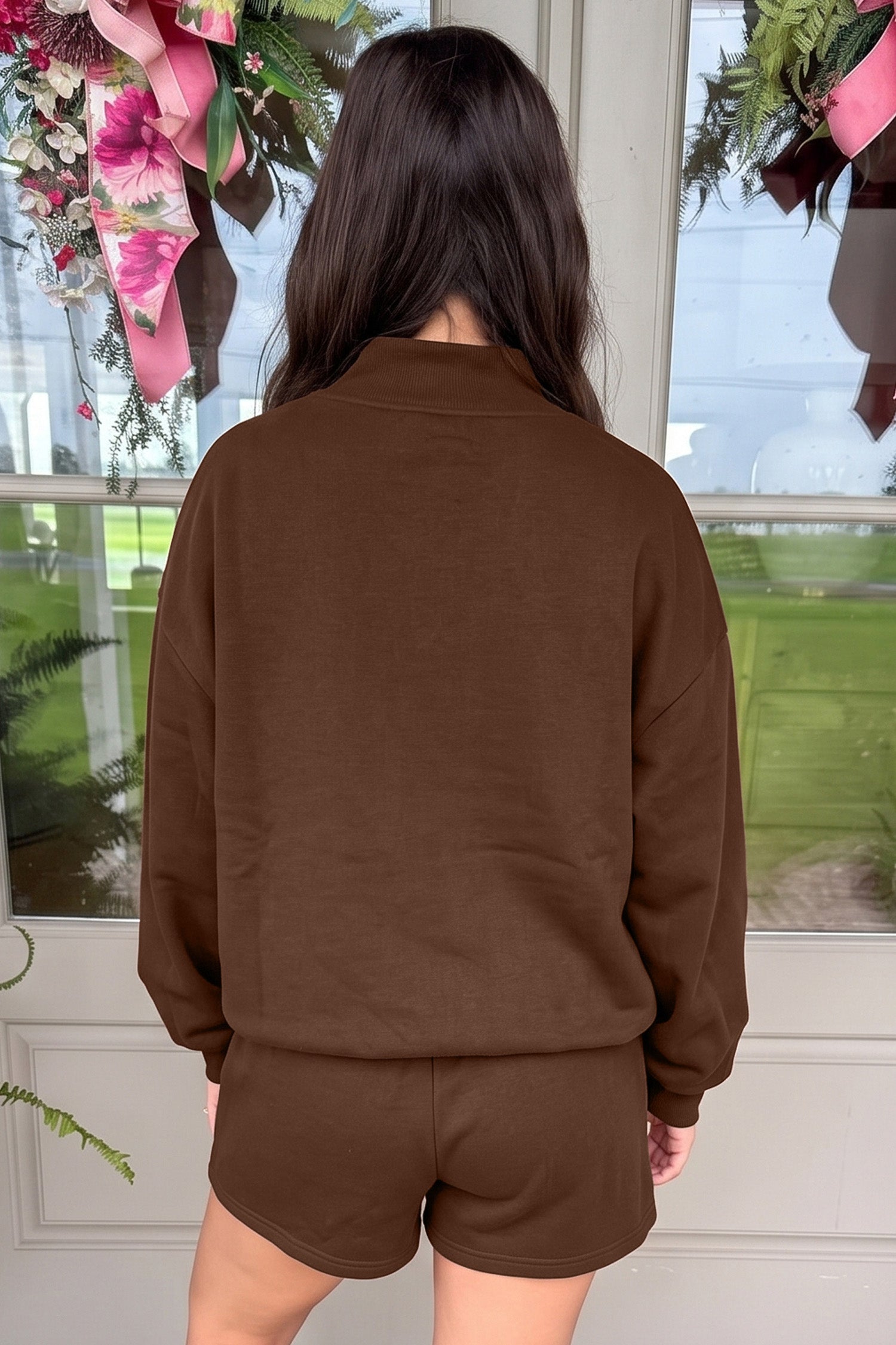 Back view of coffee mock neck sweatshirt and shorts set