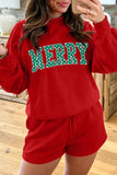 Woman in red MERRY letter patch mock neck sweatshirt and shorts set, mirror selfie