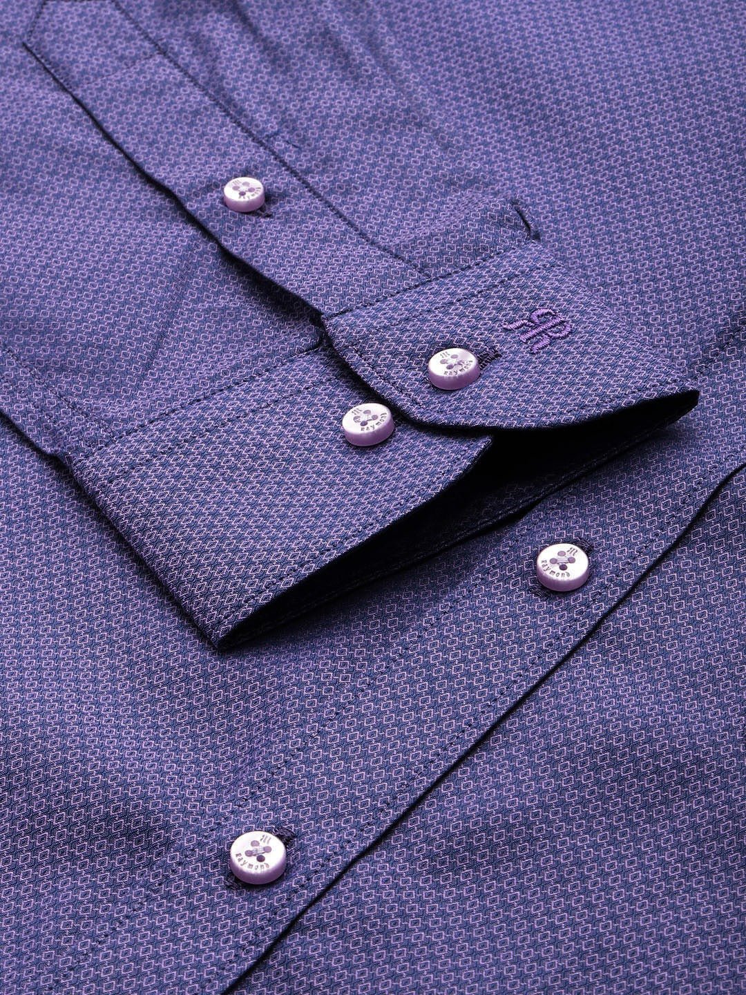 Close-up of a purple shirt with buttons and collar details