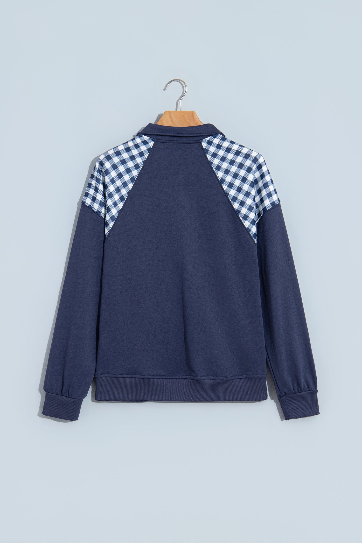 Navy blue plaid quarter zip sweatshirt, back view with gingham raglan shoulders