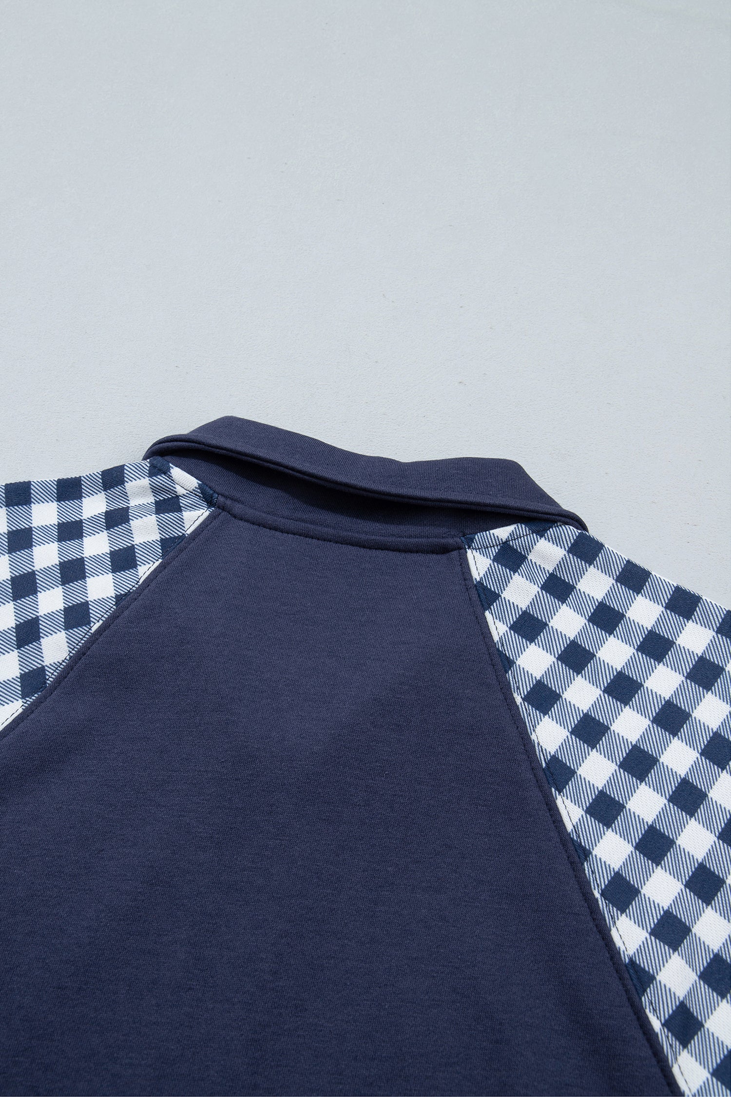 Navy blue sweatshirt back collar and gingham raglan seams
