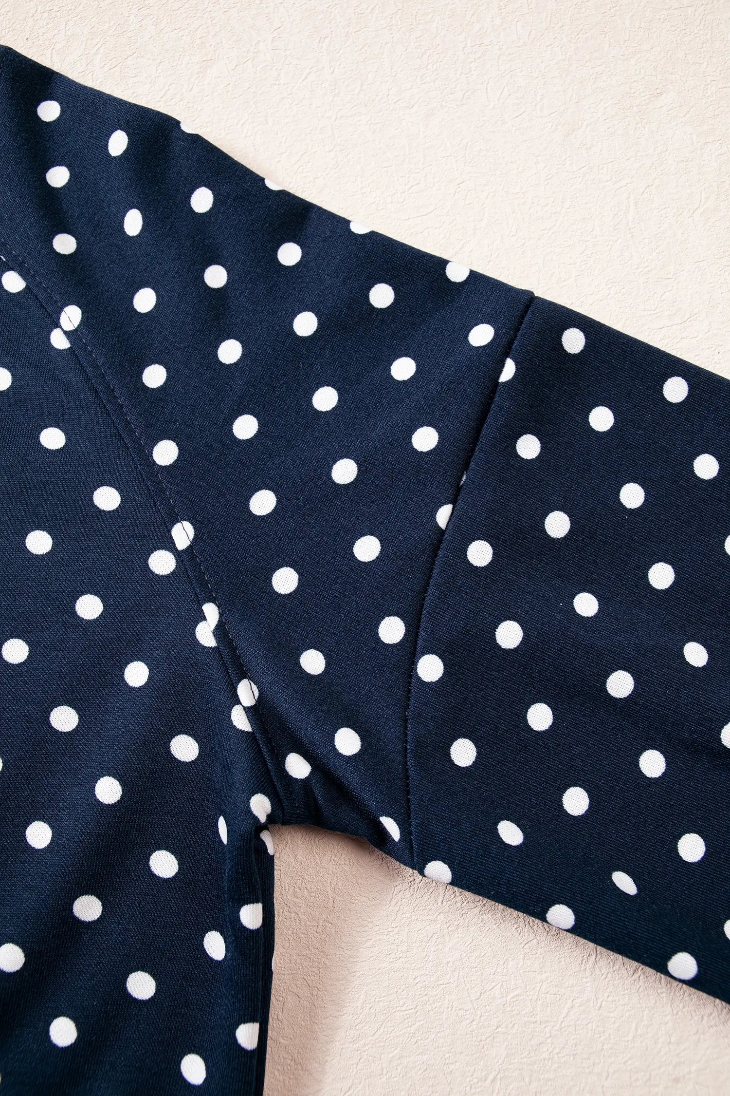 Navy fabric with white polka dots from the lounge set